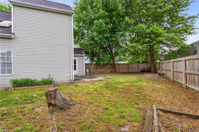 view of yard with a patio and a fenced backyard