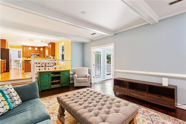 living room featuring visible vents, beam ceiling, and dark wood-style flooring