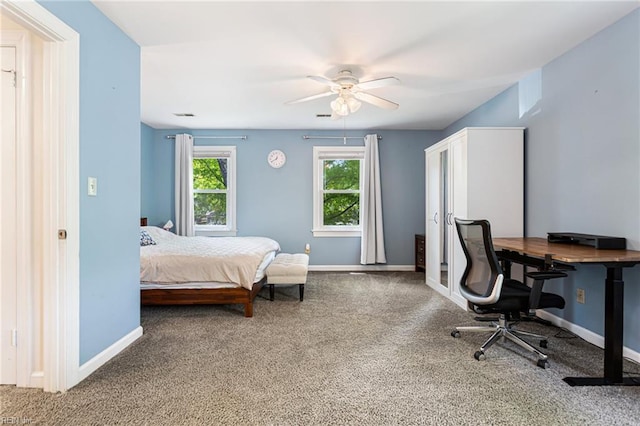 bedroom featuring carpet flooring, baseboards, and a ceiling fan