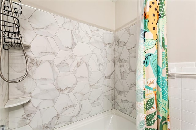 full bathroom with shower / bath combo