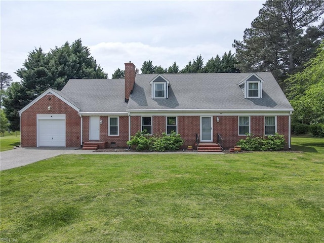 104 Stanley Dr, Williamsburg, VA 23188 - cape cod-style house with a chimney, a front lawn, driveway, brick siding, and a garage