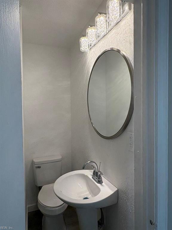 1839 Brookwood Rd, Norfolk, VA 23518 - bathroom featuring toilet and a sink