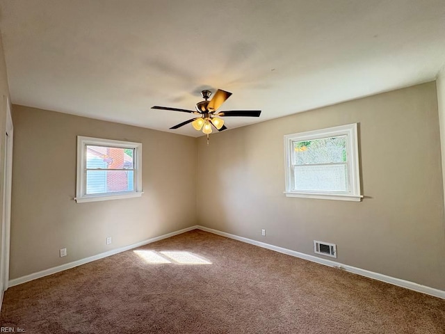 1839 Brookwood Rd, Norfolk, VA 23518 - carpeted spare room with baseboards, visible vents, and a wealth of natural light