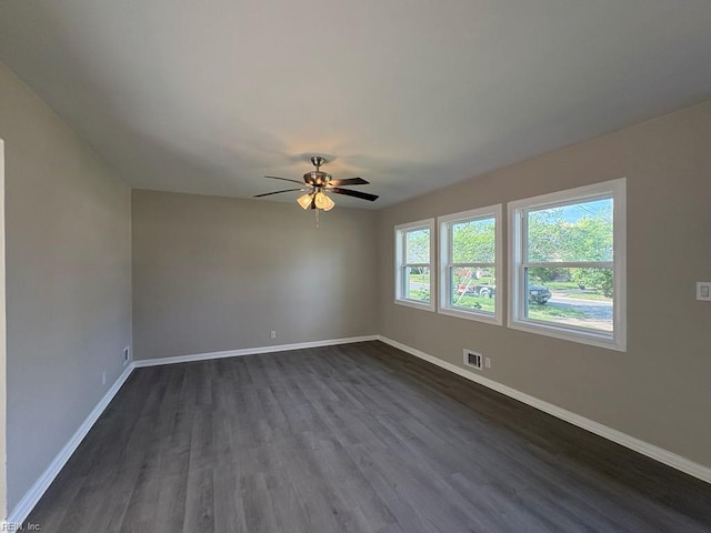 1839 Brookwood Rd, Norfolk, VA 23518 - unfurnished room featuring baseboards, a ceiling fan, dark wood-type flooring, and visible vents