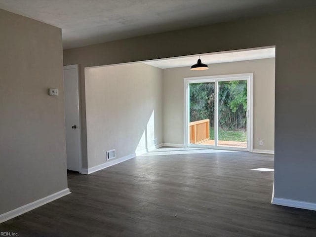 1839 Brookwood Rd, Norfolk, VA 23518 - empty room featuring baseboards, visible vents, and dark wood-style floors