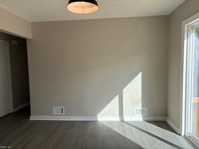 1839 Brookwood Rd, Norfolk, VA 23518 - empty room featuring baseboards, dark wood-type flooring, and visible vents