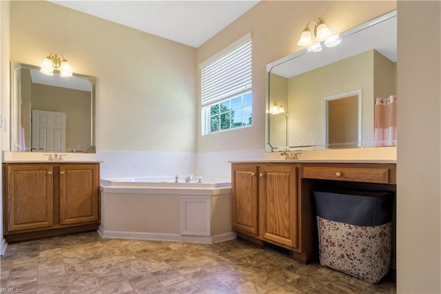 3733 Captain Wynne Dr, Williamsburg, VA 23185 - full bathroom featuring two vanities, a sink, and a garden tub