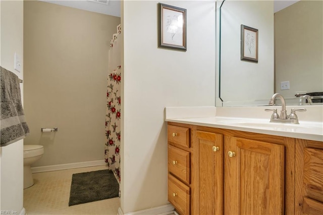 3733 Captain Wynne Dr, Williamsburg, VA 23185 - bathroom with vanity, baseboards, tile patterned floors, toilet, and a shower with shower curtain