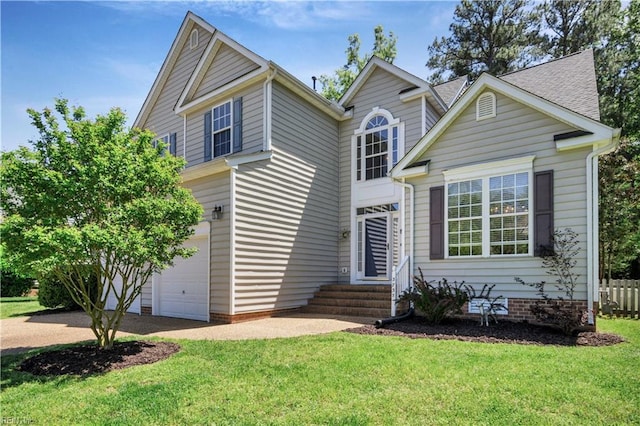 3733 Captain Wynne Dr, Williamsburg, VA 23185 - view of front facade featuring a front yard, driveway, entry steps, and a garage