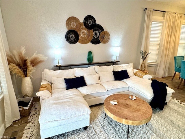 living area with wood finished floors