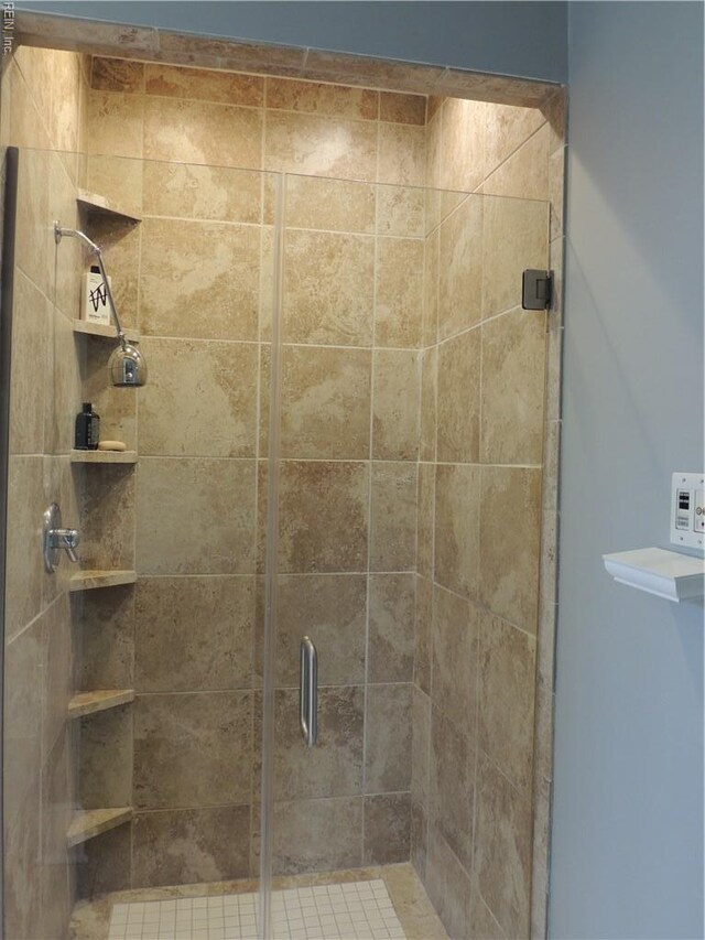 full bathroom with a shower stall