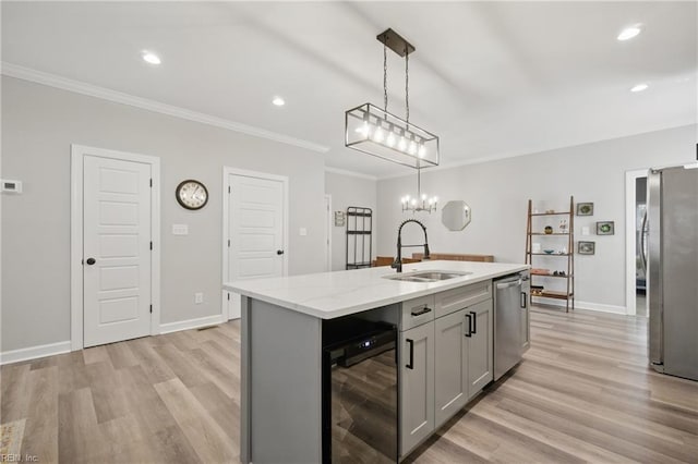 429 Maryland Ave, Norfolk, VA 23508 - kitchen featuring gray cabinets, stainless steel appliances, light wood finished floors, a sink, and wine cooler