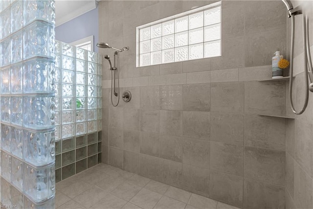bathroom featuring a walk in shower and ornamental molding
