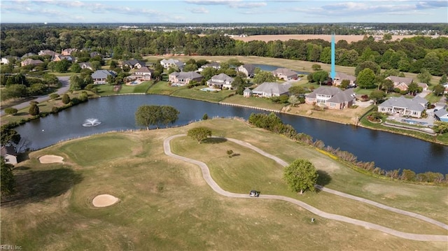birds eye view of property with a water view, view of golf course, and a residential view