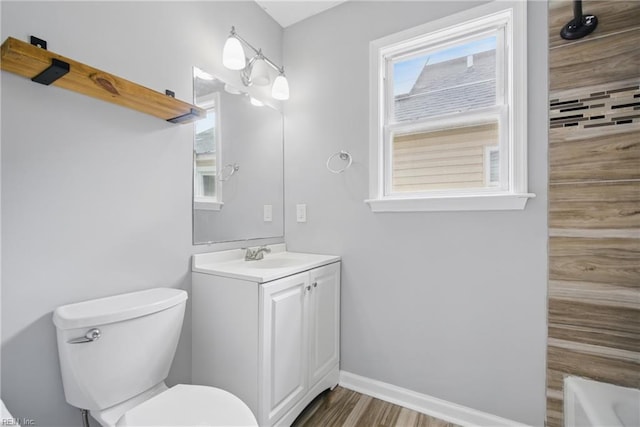 237 Pochin Pl, Hampton, VA 23661 - bathroom featuring plenty of natural light, baseboards, vanity, and toilet