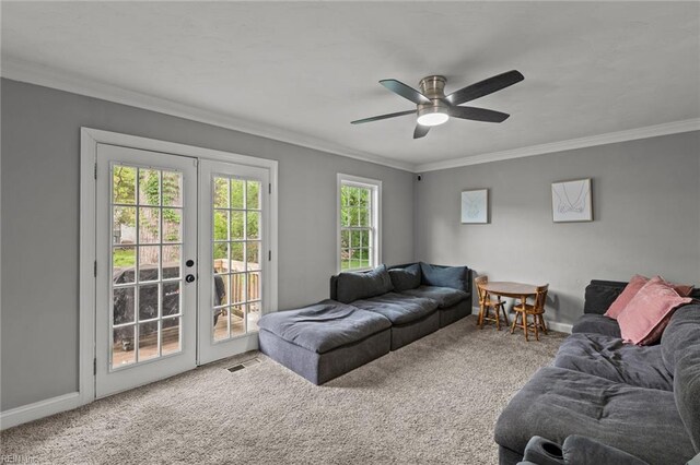 212 Cherokee Rd, Hampton, VA 23661 - carpeted living room featuring french doors, baseboards, a ceiling fan, and crown molding