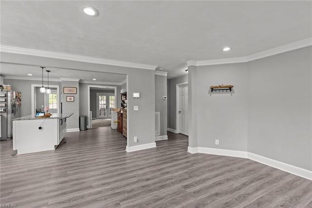 212 Cherokee Rd, Hampton, VA 23661 - unfurnished living room featuring baseboards, ornamental molding, wood finished floors, and recessed lighting