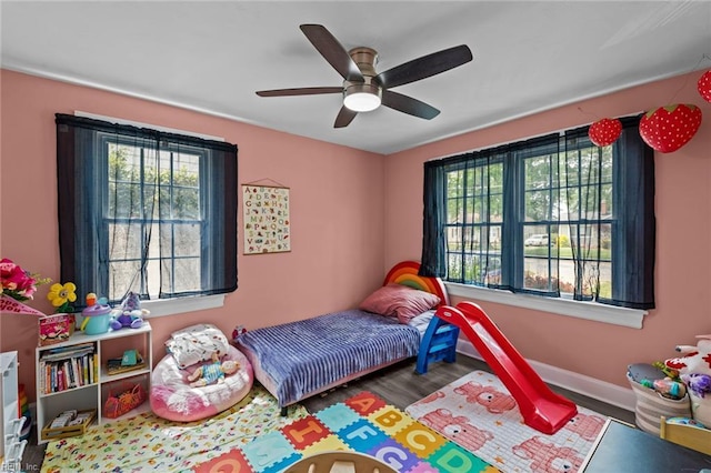 212 Cherokee Rd, Hampton, VA 23661 - bedroom featuring ceiling fan, baseboards, wood finished floors, and multiple windows