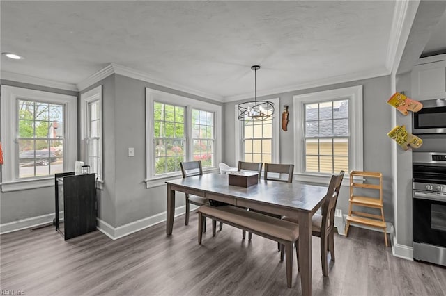 212 Cherokee Rd, Hampton, VA 23661 - dining area featuring baseboards, an inviting chandelier, and ornamental molding