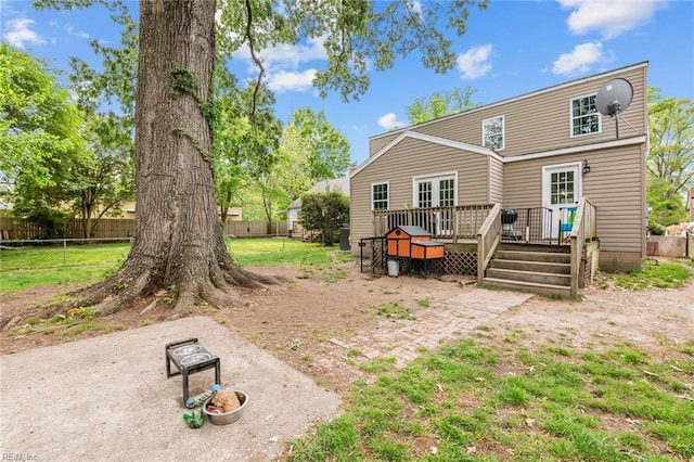 212 Cherokee Rd, Hampton, VA 23661 - rear view of house featuring fence and a wooden deck