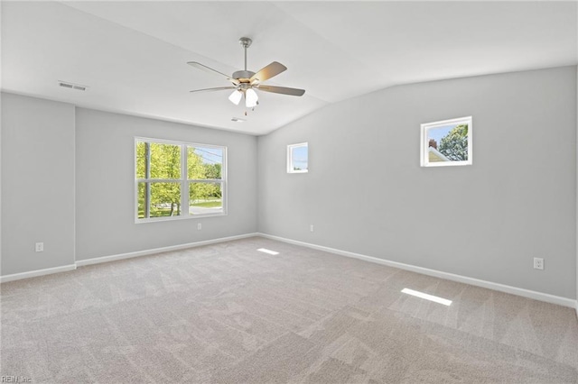 6471 Swan Arch, Norfolk, VA 23513 - carpeted spare room with baseboards, visible vents, a ceiling fan, and vaulted ceiling