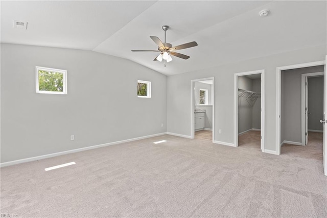 6471 Swan Arch, Norfolk, VA 23513 - unfurnished bedroom featuring visible vents, baseboards, light colored carpet, lofted ceiling, and a spacious closet