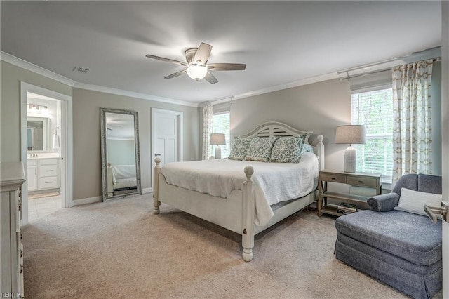 bedroom with multiple windows, a ceiling fan, light colored carpet, and crown molding
