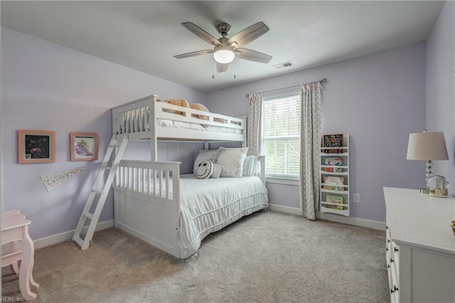 bedroom with carpet floors, visible vents, and baseboards