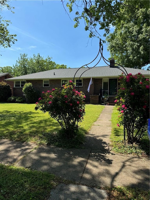 521 N Shore Rd, Norfolk, VA 23505 - single story home featuring a front lawn and brick siding