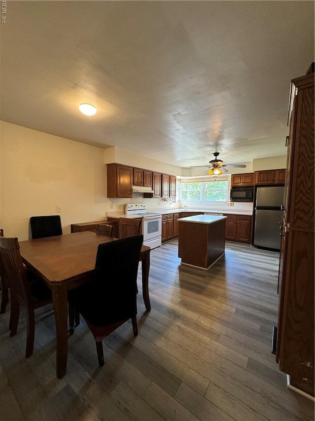 521 N Shore Rd, Norfolk, VA 23505 - dining area with ceiling fan and dark wood-type flooring
