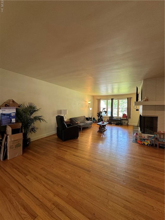 521 N Shore Rd, Norfolk, VA 23505 - living room with wood finished floors and a fireplace