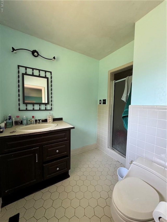 521 N Shore Rd, Norfolk, VA 23505 - bathroom with toilet, a shower stall, and vanity