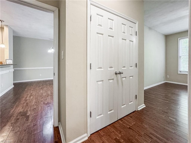 1004 Christiana Cir, Portsmouth, VA 23703 - hallway with baseboards and dark wood-type flooring
