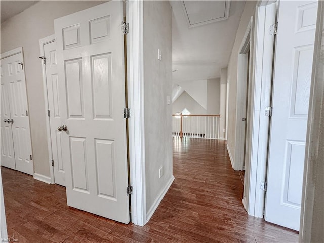 1004 Christiana Cir, Portsmouth, VA 23703 - hallway with dark wood-type flooring, baseboards, and an upstairs landing