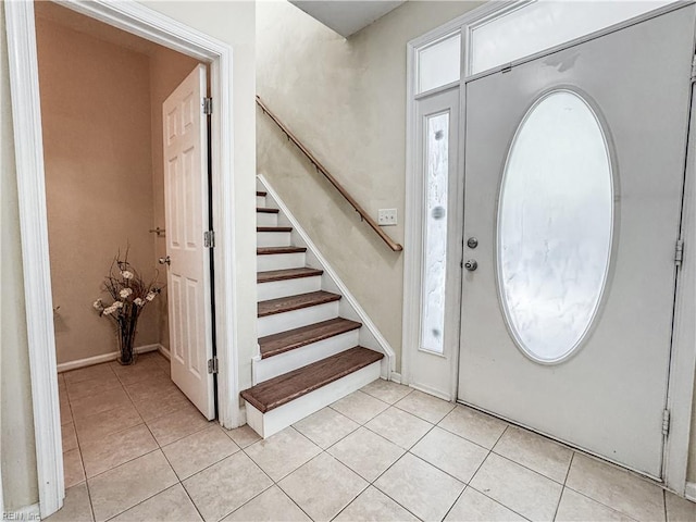 1004 Christiana Cir, Portsmouth, VA 23703 - entrance foyer featuring stairway, baseboards, and light tile patterned floors
