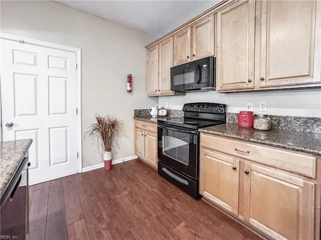 1004 Christiana Cir, Portsmouth, VA 23703 - kitchen featuring dark stone counters, light brown cabinetry, black appliances, and dark wood finished floors