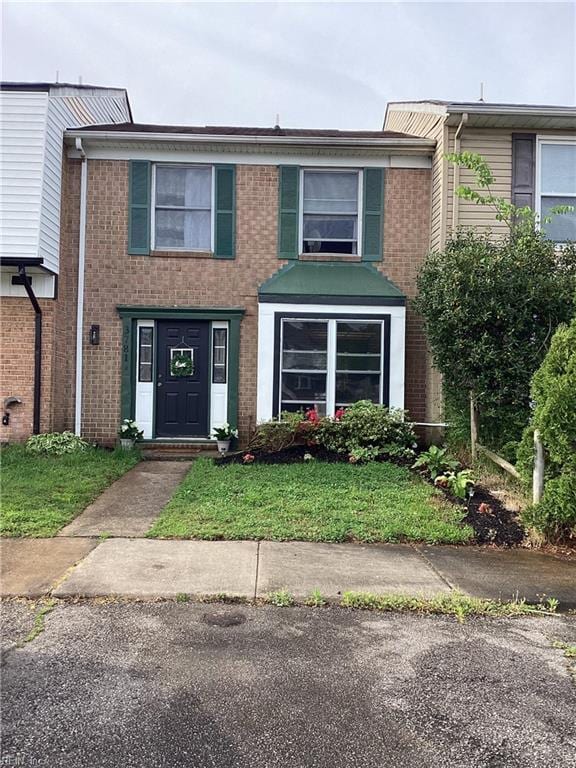 multi unit property featuring brick siding