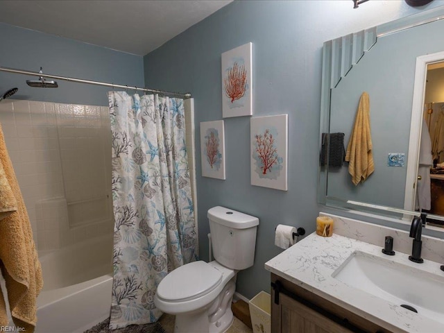 full bath featuring shower / bath combo with shower curtain, toilet, and vanity