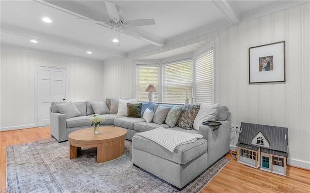 living room with beamed ceiling, a ceiling fan, wood finished floors, and recessed lighting