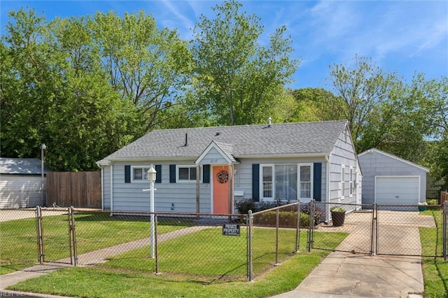 ranch-style house with driveway, an outdoor structure, a gate, a front lawn, and a garage