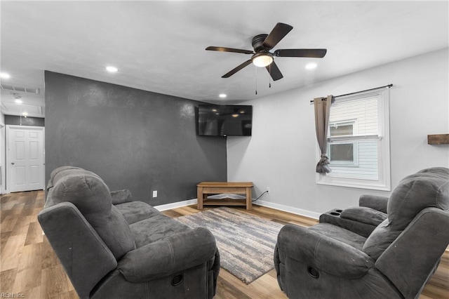 living room featuring baseboards, wood finished floors, recessed lighting, and ceiling fan