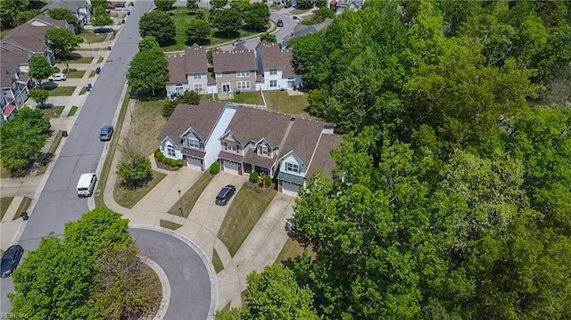 birds eye view of property with a residential view