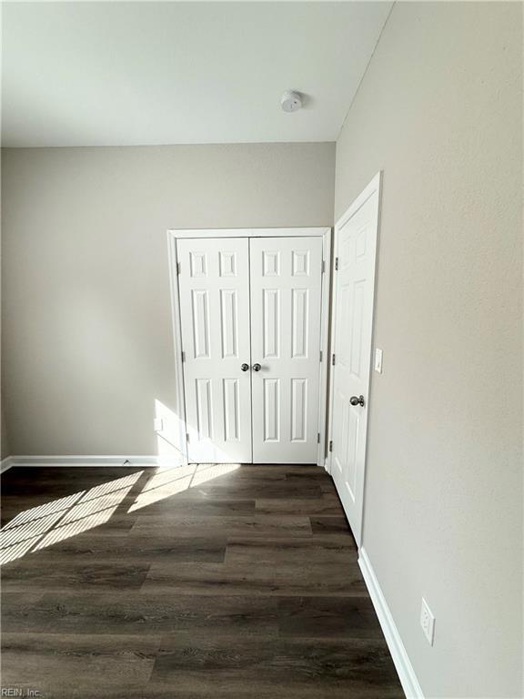 806 Fontaine St Unit B, Franklin, VA 23851 - corridor featuring baseboards and dark wood-type flooring