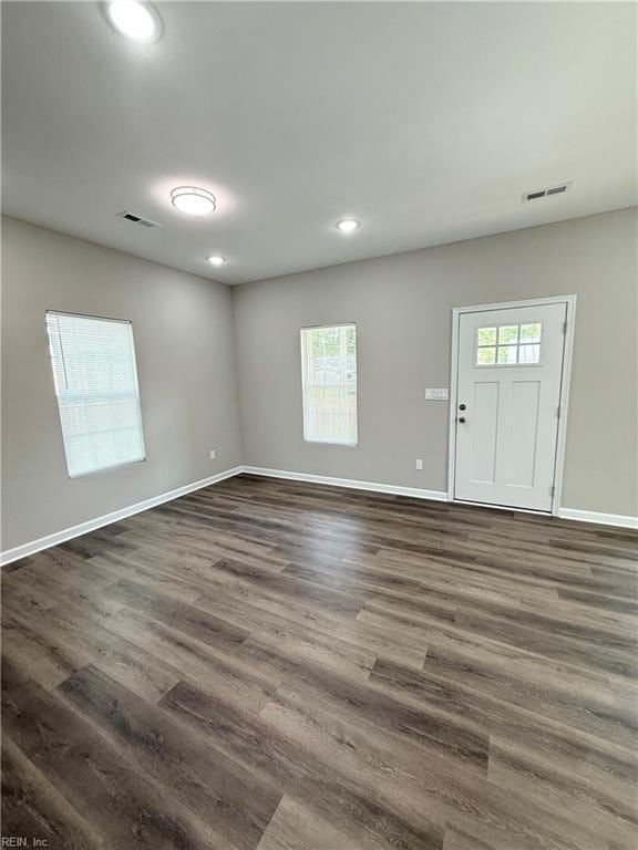 806 Fontaine St Unit B, Franklin, VA 23851 - interior space featuring baseboards, dark wood-type flooring, and visible vents