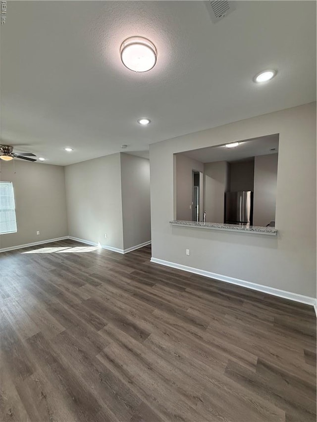 806 Fontaine St Unit B, Franklin, VA 23851 - unfurnished room featuring visible vents, baseboards, and dark wood-style flooring