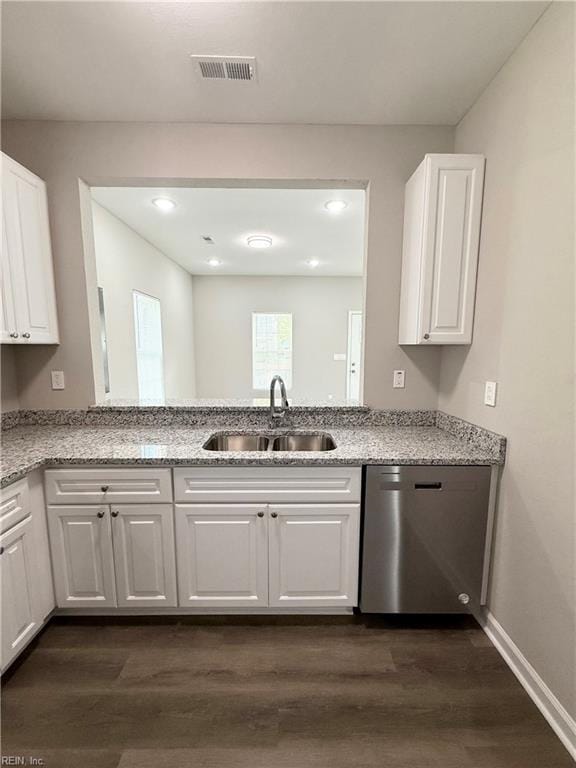 806 Fontaine St Unit B, Franklin, VA 23851 - kitchen with white cabinets, dark wood finished floors, dishwasher, visible vents, and a sink