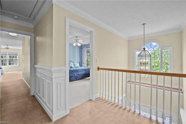 4011 E Providence Rd, Williamsburg, VA 23188 - hallway featuring attic access, baseboards, a notable chandelier, carpet floors, and ornamental molding