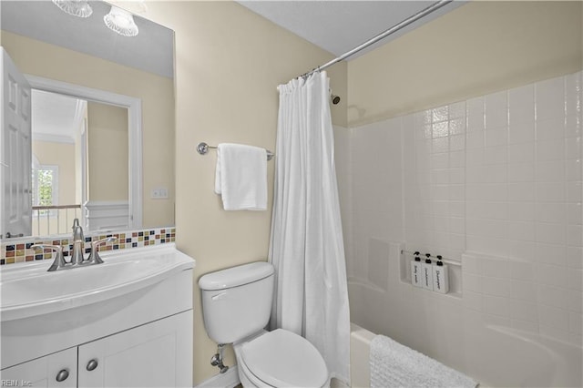 4011 E Providence Rd, Williamsburg, VA 23188 - full bath featuring toilet, shower / tub combo with curtain, vanity, and tasteful backsplash