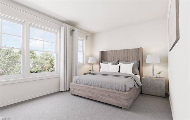 carpeted bedroom with baseboards