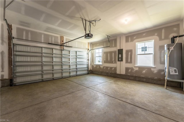 garage featuring water heater, a garage door opener, and electric panel
